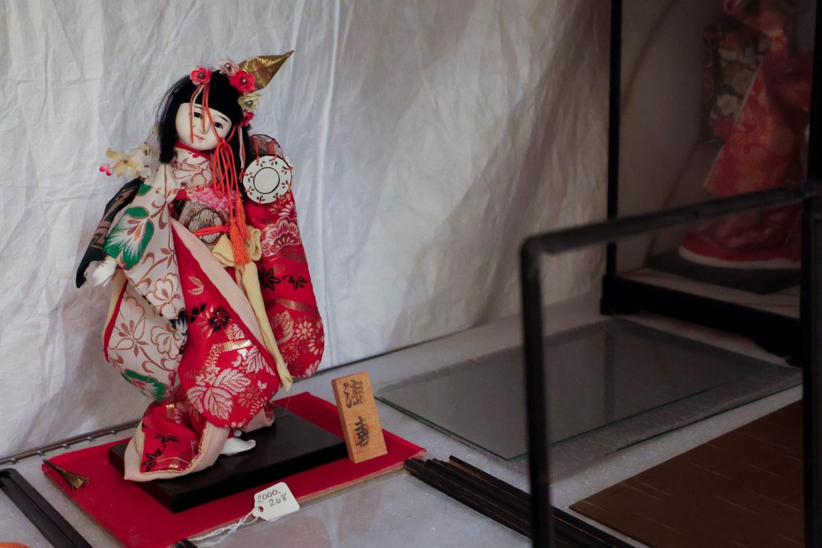 Geisha dolls sit in the Avenir Museum, showcasing the varying forms of textiles and accessories that are held in the museum, Oct. 6.