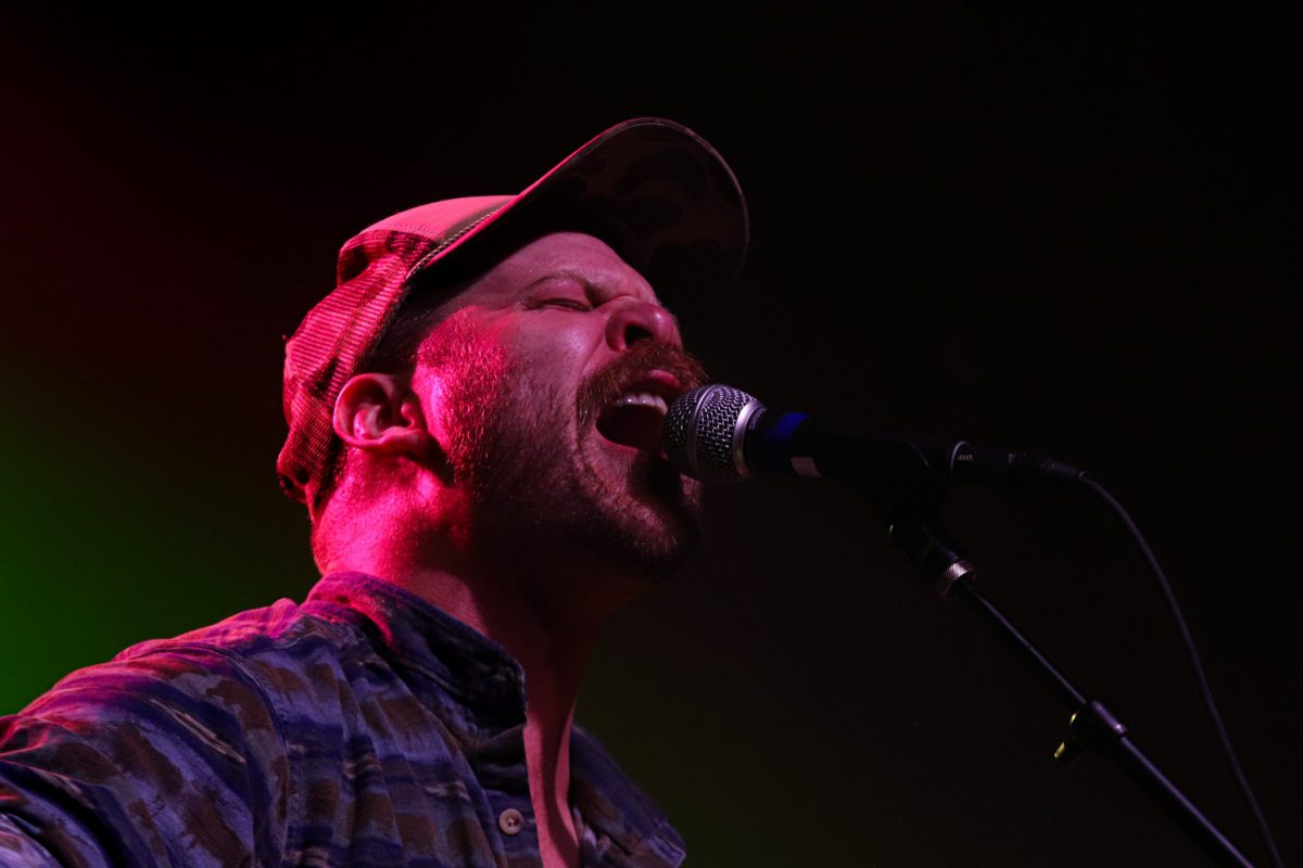 Lee Henke, the lead singer and guitarist for The Last Revel, plays in the second show of the band's co-headlined tour with Oliver Hazard at the Aggie Theatre Oct. 9. 