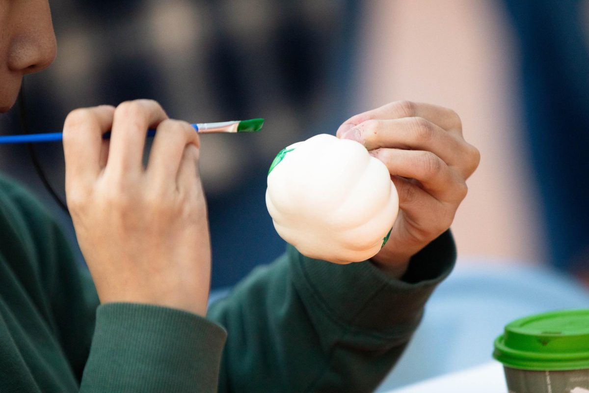 Students paint pumpkins at ASCSU and APACC's Pumpkin Palooza event at the Lory Student Center in Fort Collins Colorado, Oct. 28. "It's such a cute event." APACC member Divisha Khadka.