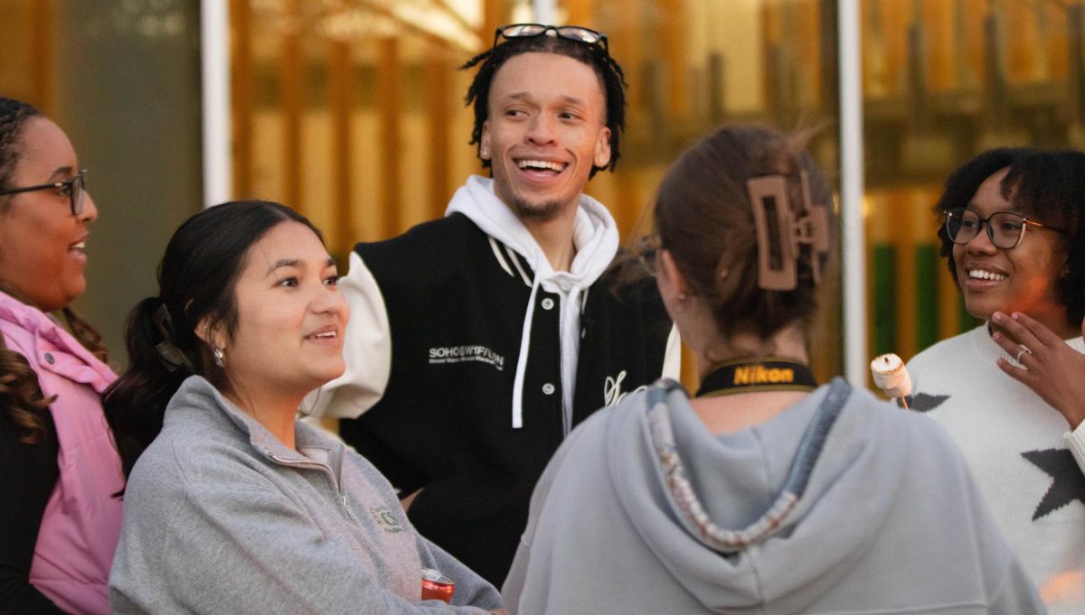 Associated Students of Colorado State University and Asian Pacific American Cultural Center members enjoy the firepit outside the Lory Student Center for the Pumpkin Palooza event Oct. 28, 2025. "It's really nice to have a space to come and hang out," said Gaurav Harshe, an employee for APACC.