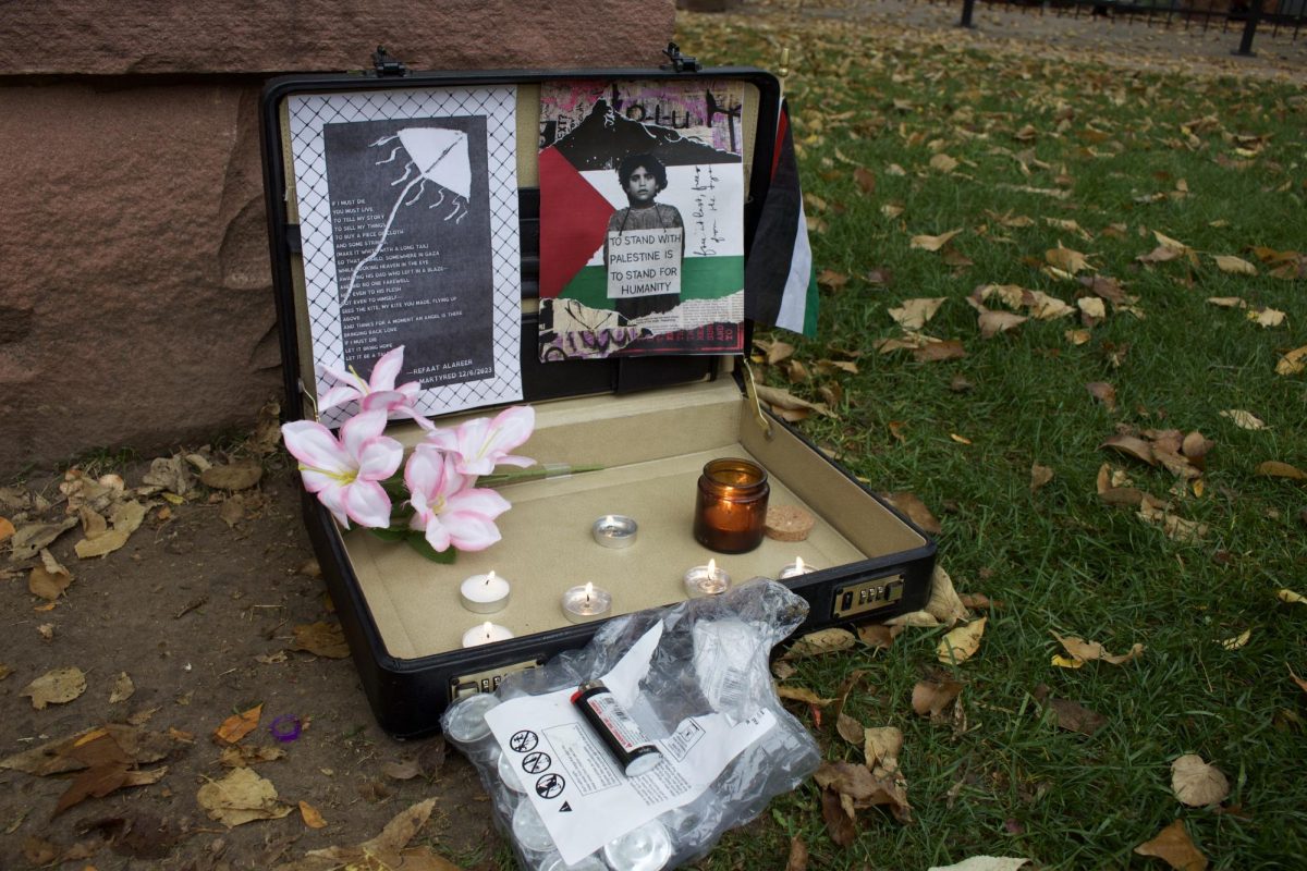 A small memorial paying tribute to those who died in the Israel-Hamas war is set up at the Old Town Library as protesters prepare to march 14 miles in solidarity with displaced Palestinians Oct. 11.