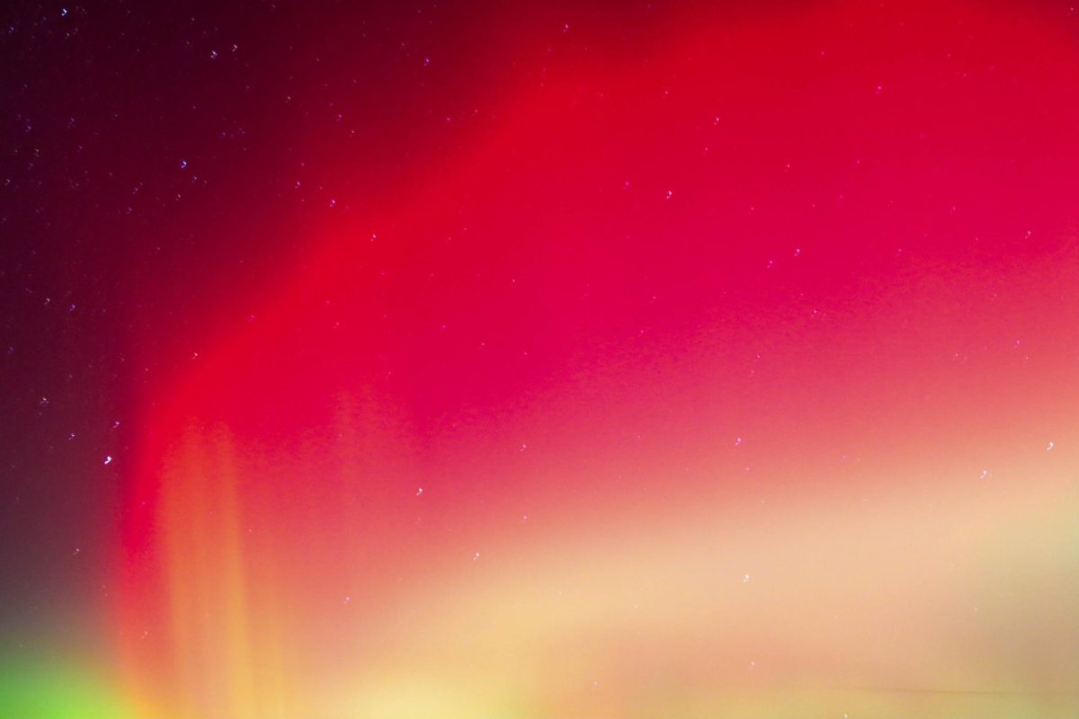 The Northern Lights stretch across the sky near the base of the Poudre Canyon on November 11, 2025. (Katie Fisher | The Collegian). 