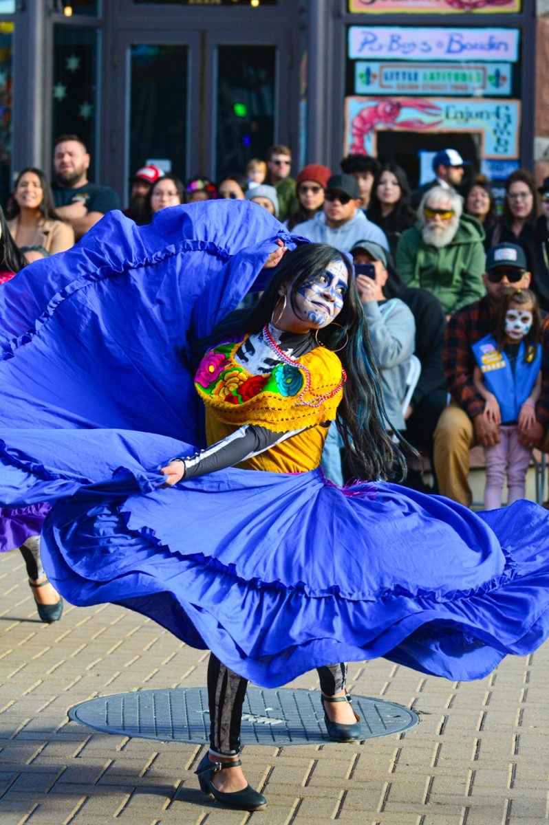 A dancer in the Dia de Los Muertos event in Old Town Square Oct. 1. This dance is to represent and allow everyone to be a part of Mexican culture as we honor our dead. 