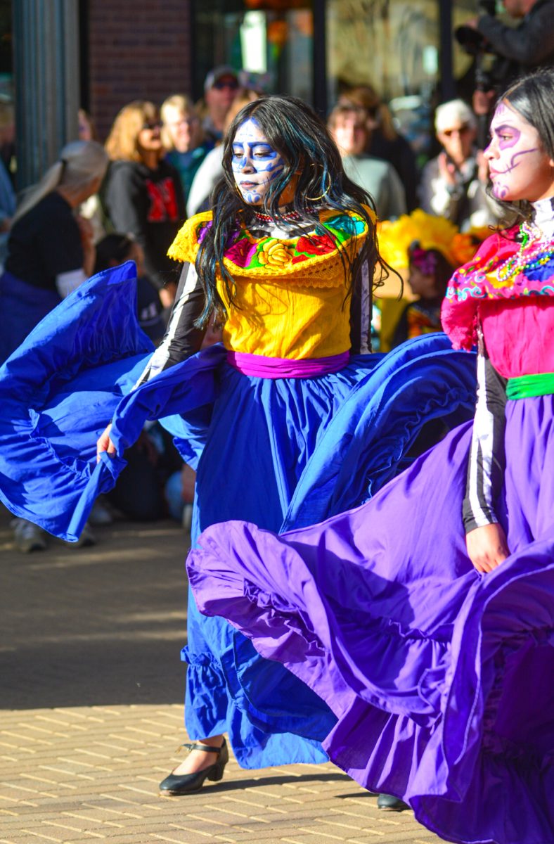 Dia de Los Muertos is a beautiful, vibrant and joyful celebration that is often celebrated through dance Nov. 1. This dancer alongside her two other dancers performed many festive dances. 