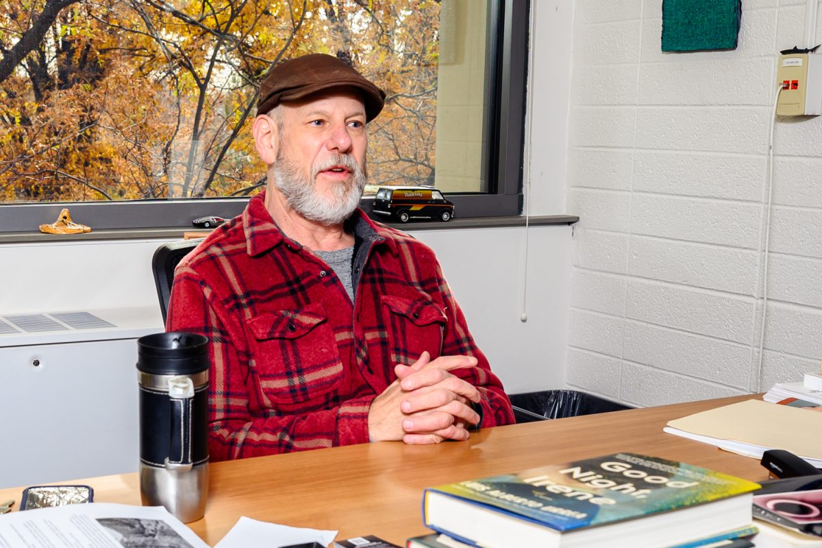Colorado State University professor and author Matthew Cooperman speaks about his recent poetry in his office Nov. 3.