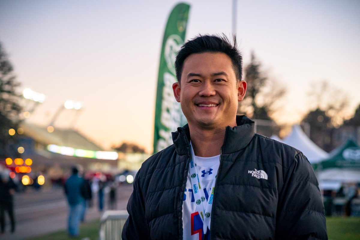 Colorado State Alumn Patrick Suzuki poses for a photo before the football game against the University of Nevada, Las Vegas Saturday, Nov. 8. Suzuki returned to campus after appearing as a contestant on the most recent season of the reality dating show Love is Blind. Before joining the cast of the Netflix show, Suzuki studied construction management at CSU and graduated with his degree in 2016 before moving to Denver. 