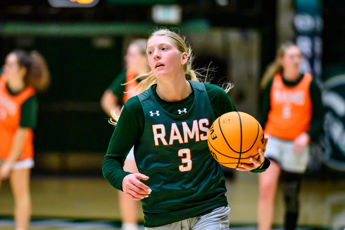 Colorado State University women's basketball guard Lexus Bargesser (3) dribbles the ball down the court during practice Nov. 19.
