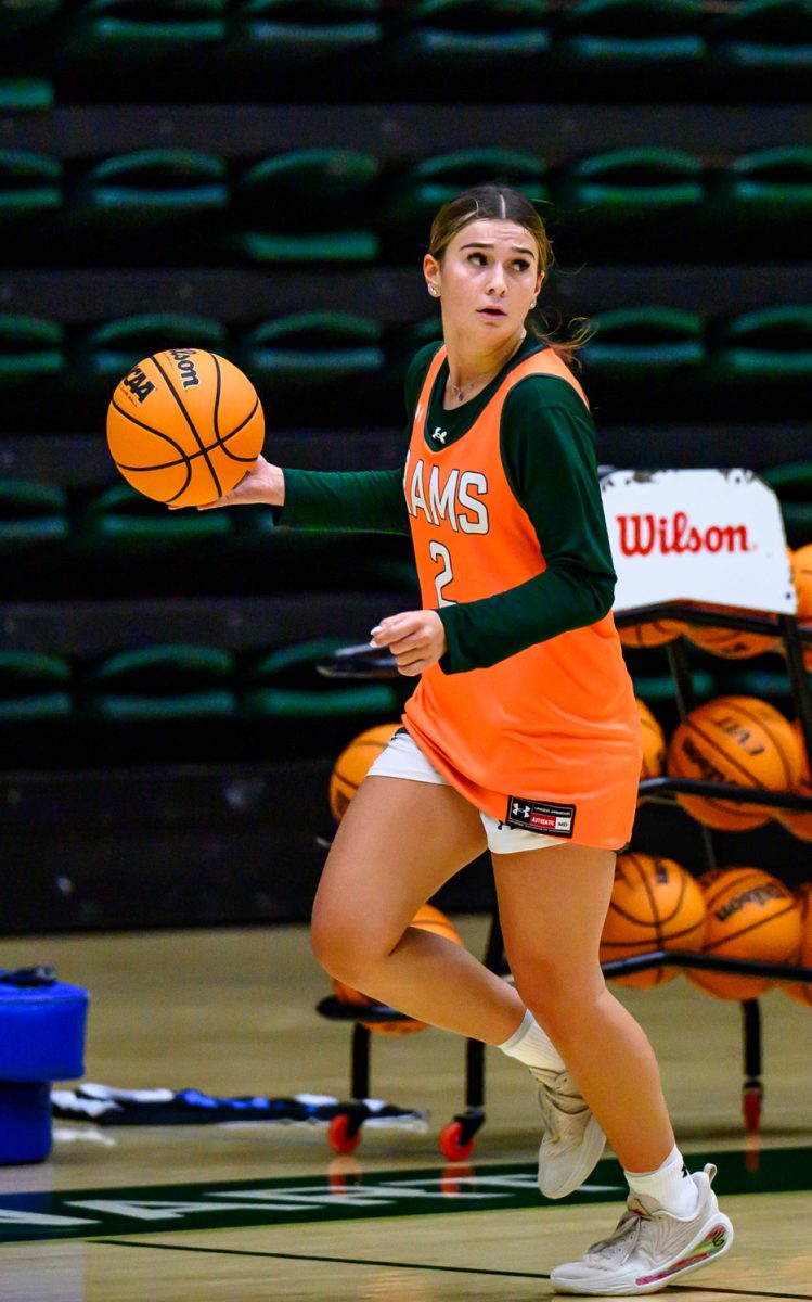Colorado State University women's basketball guard Brooke Carlson (2) dribbles the ball down the court during practice Nov. 19.