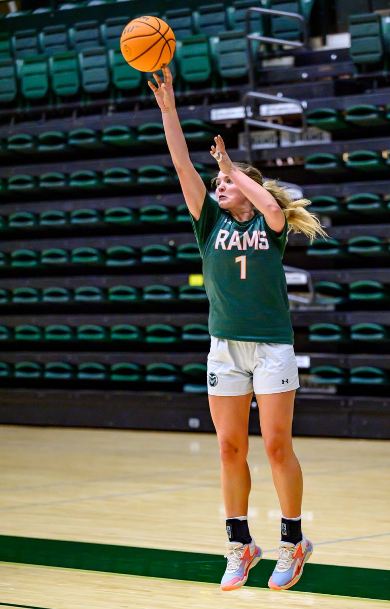 Colorado State University women's basketball guard 
Kloe Froebe (1) takes a shot during shooting drills Nov. 19.