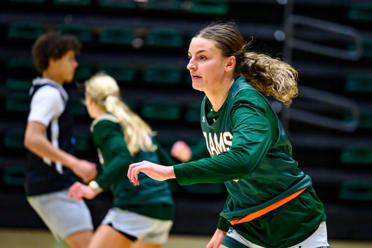 Colorado State University women's basketball forward Madelyn Bragg (0) puts pressure on an offensive play during practice Nov. 19.
