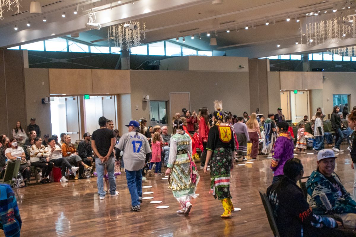 Folks participate in a cake walk during the American Indian Science and Engineering Society Powwow Nov 1. The Powwow is the 41st in Colorado State University history.