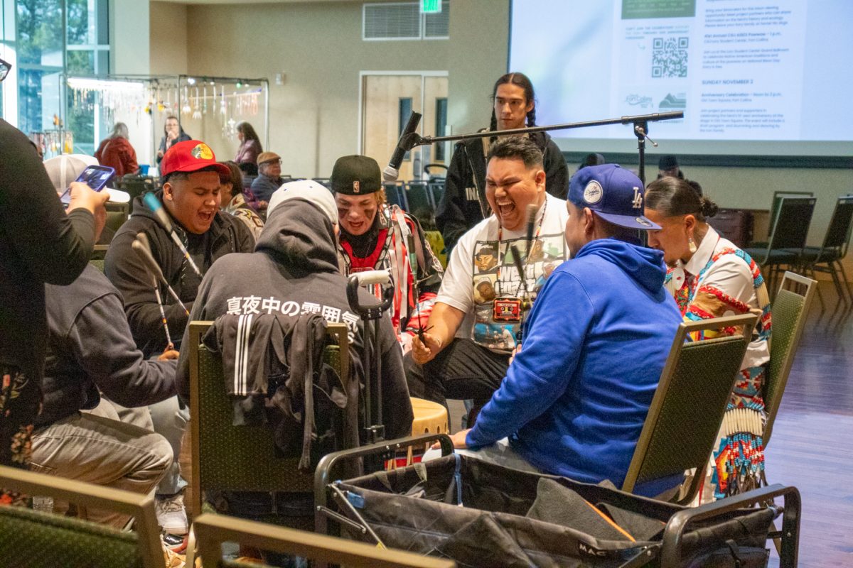 Members of a drum circle sing and perform at Attendees participate in intertribal dance during the American Indian Science and Engineering Society Powwow Nov 1. The Powwow is the 41st in Colorado State University history.