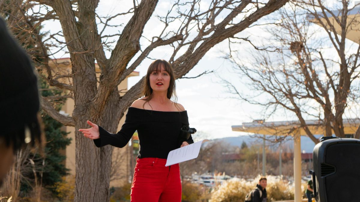 Colorado State University student Amber Wright delivers remarks at the Mass Student Assembly on The Plaza Nov. 19. The assembly was held by The United Front, a collaboration of Students for Justice Palestine, CSU Young Democratic Socialists of America, CSU Students for Emancipation and Social Liberation and The People United CSU and CSU Young Dems. The protest called for revised free speech policies, freedom in Palestine, and resistance from CSU against current federal directives. 
