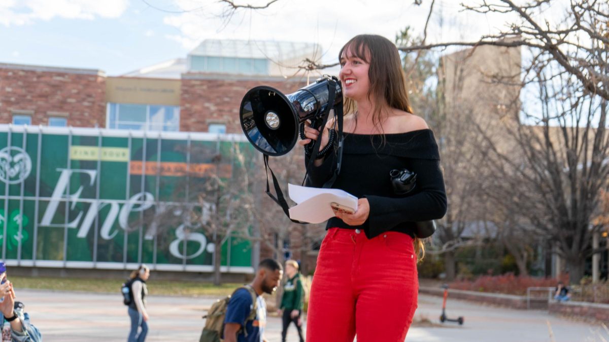 Colorado State University student Amber Wright delivers remarks at the Mass Student Assembly on The Plaza Nov. 19. The assembly was held by The United Front, a collaboration of Students for Justice Palestine, CSU Young Democratic Socialists of America, CSU Students for Emancipation and Social Liberation and The People United CSU and CSU Young Dems. The protest called for revised free speech policies, freedom in Palestine, and resistance from CSU against current federal directives. 