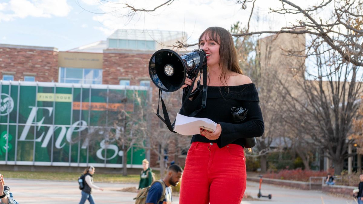Colorado State University student Amber Wright delivers remarks at the Mass Student Assembly on The Plaza Nov. 19. The assembly was held by The United Front, a collaboration of Students for Justice Palestine, CSU Young Democratic Socialists of America, CSU Students for Emancipation and Social Liberation and The People United CSU and CSU Young Dems. The protest called for revised free speech policies, freedom in Palestine, and resistance from CSU against current federal directives. 