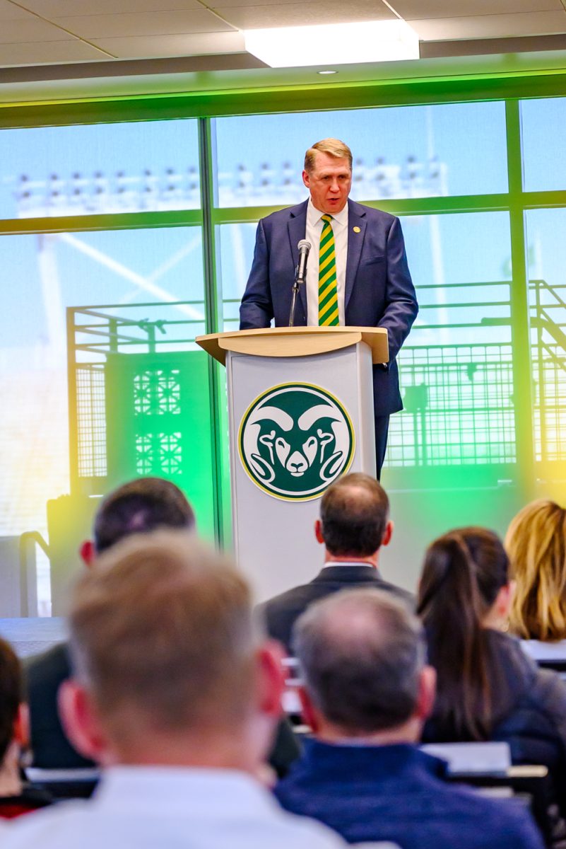 Director of Athletics John Weber introduces Jim Mora, the new head football coach for Colorado State University, during a press conference in Canvas Stadium Dec. 1.