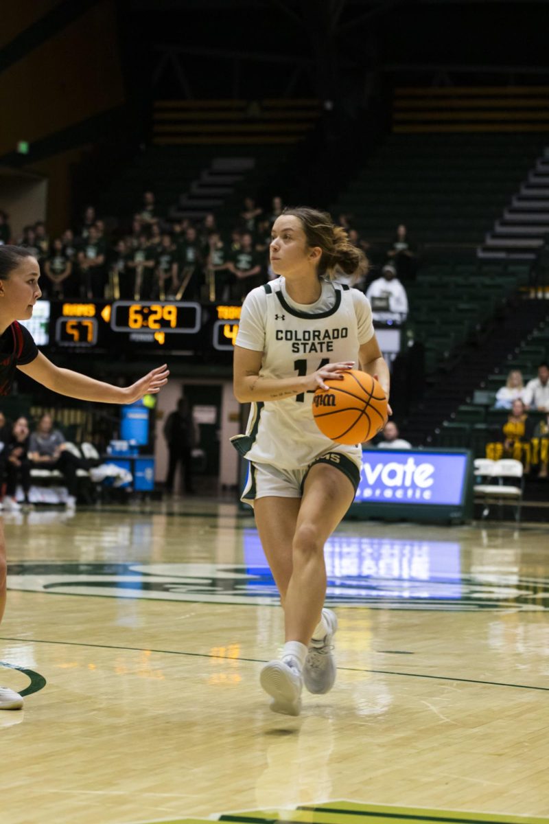Senior Marta Leimane (14), a guard for Colorado State University, dribbles the ball in game against Southern Utah. CSU played in Moby Arena and won 70-47 Dec. 7.