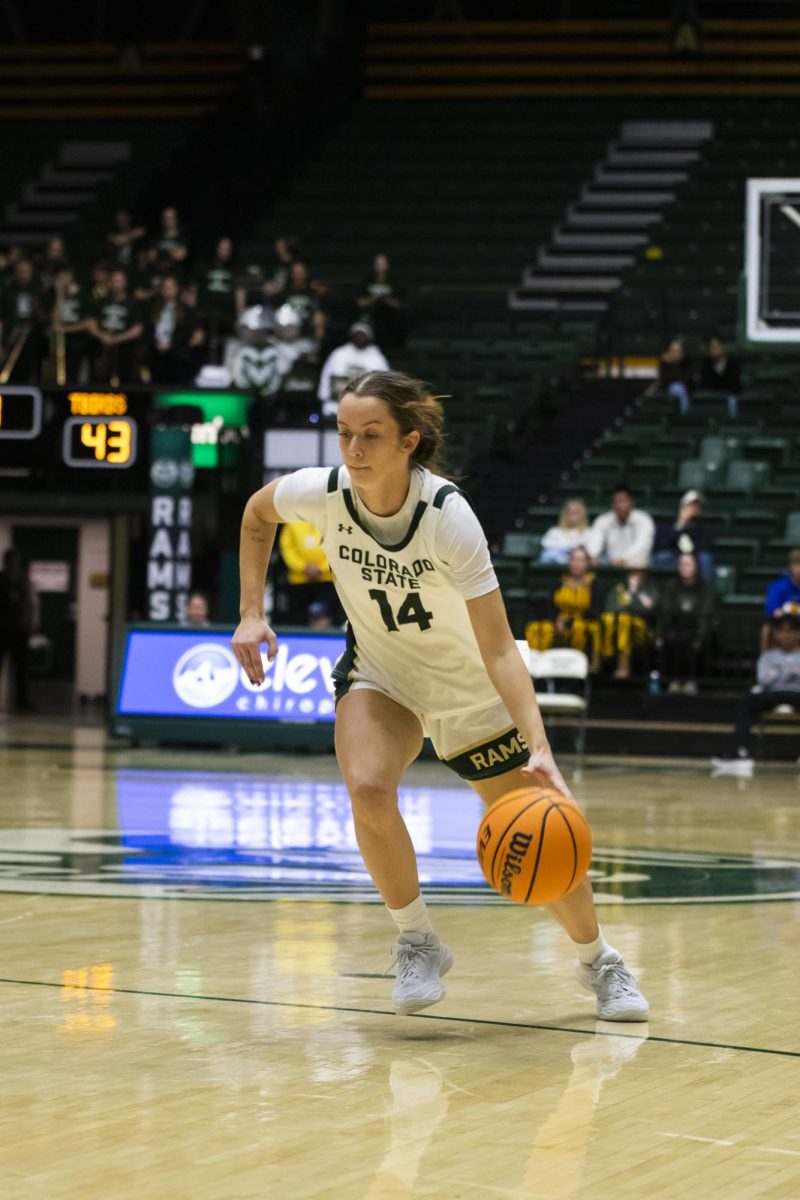 Senior Marta Leimane (14), a guard for Colorado State University, dribbles the ball in game against Southern Utah. CSU played in Moby Arena and won 70-47 Dec. 7.