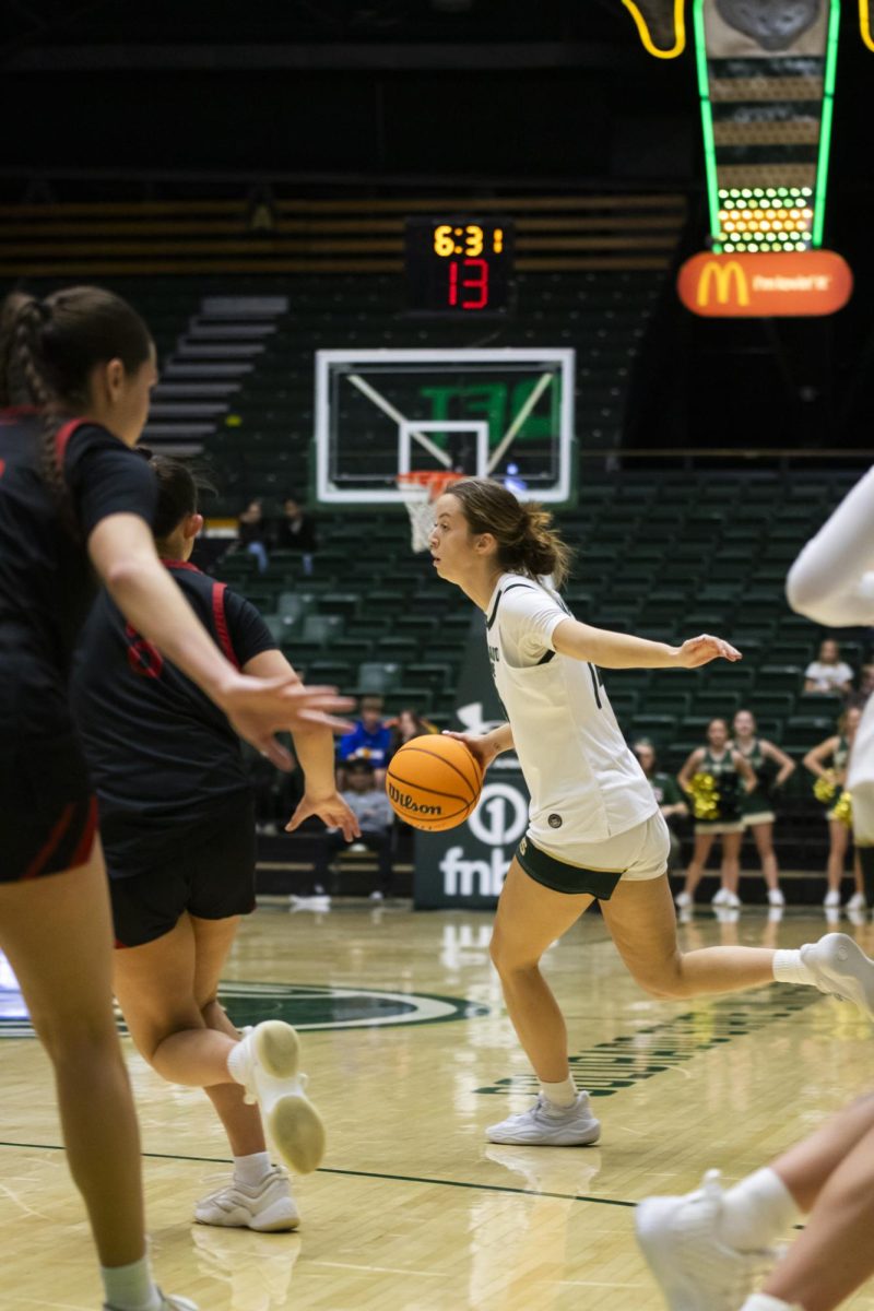 Senior Marta Leimane (14), a guard for Colorado State University, dribbles the ball in game against Southern Utah. CSU played in Moby Arena and won 70-47 Dec. 7.