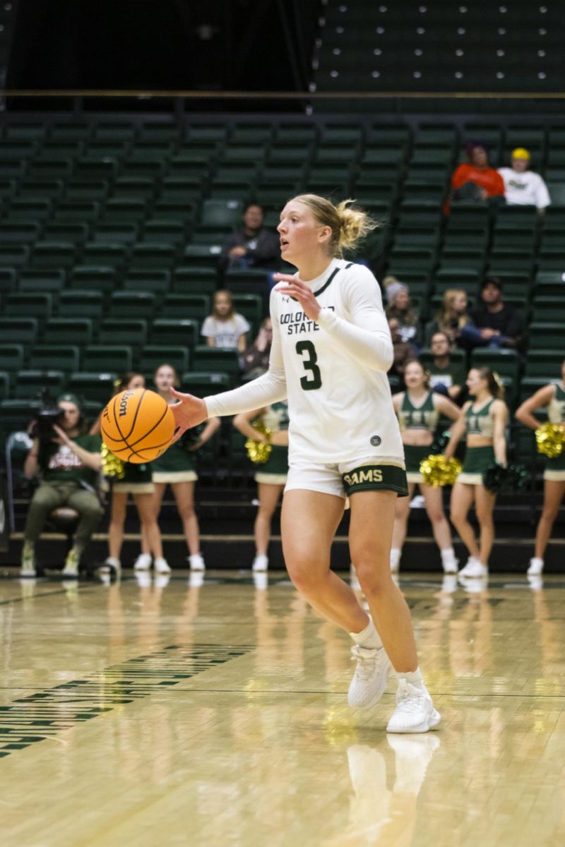 Senior Lexus Bargesser (3), a guard for Colorado State University, dribbles the ball in game against Southern Utah. CSU played in Moby Arena and won 70-47 Dec. 7.