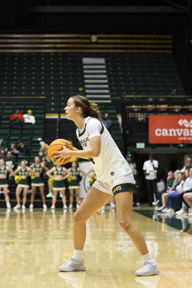 Senior Marta Leimane (14), a guard for Colorado State University, passes the ball in game against Southern Utah. CSU played in Moby Arena and won 70-47 Dec. 7.
