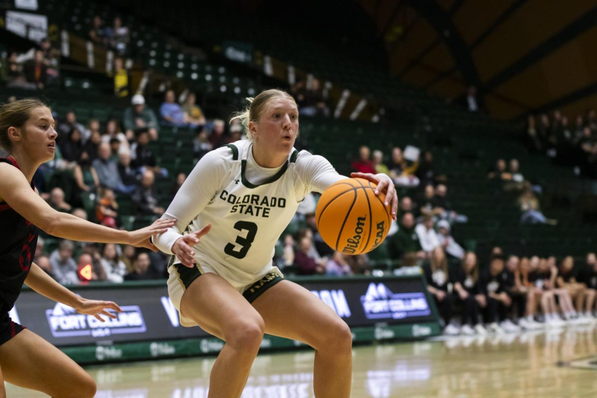 Senior Lexus Bargesser (3), a guard for Colorado State University, controls the ball in game against Southern Utah. CSU played in Moby Arena and won 70-47 Dec. 7.