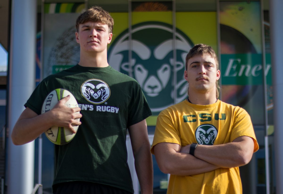 Colorado State University men’s rugby team members Roman Van Zyl, a forward, and team captain Brock Scanlan pose for a photo Dec. 12, 2025.