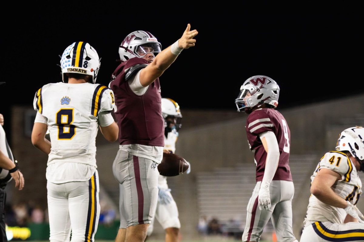 Tanner Gray celebrates a first down during the Canvas Community Classic game between the Wellington Eagles and Timnath Cubs Sept. 26, 2025.