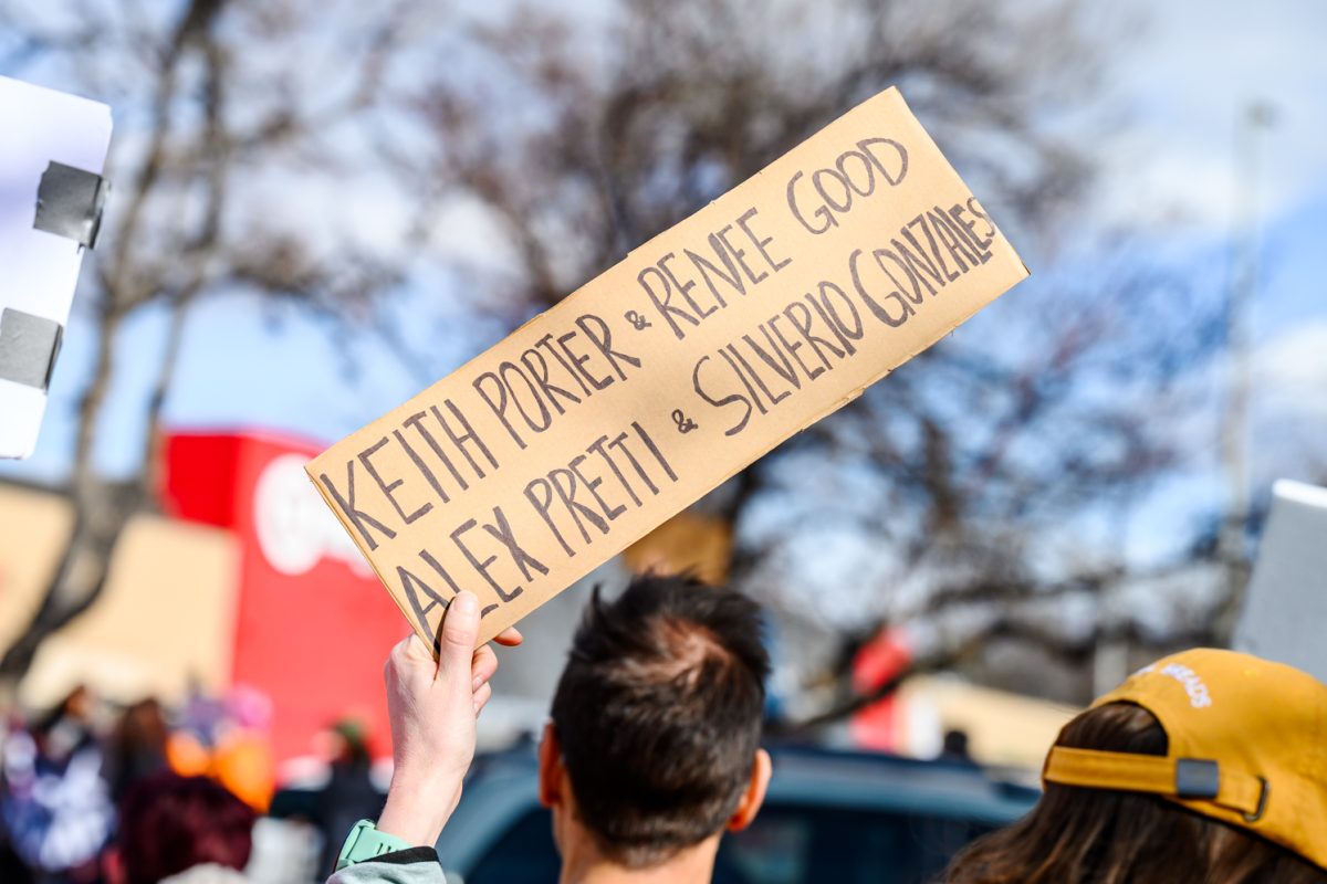 A protester holds up a sign reading the names of Keith Porter, Renee Good, Alex Pretti and Silverio Gonzalez, all civilians killed by United States Immigration and Customs Enforcement agents Jan. 30.