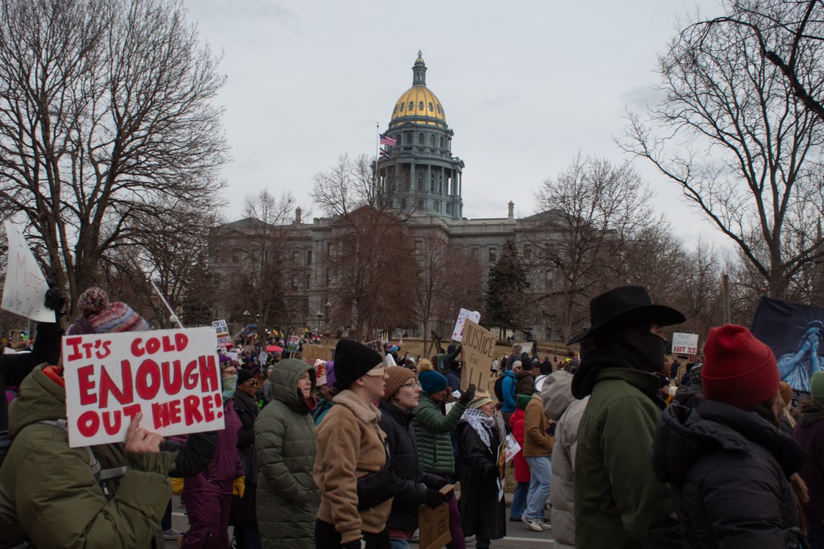 Protest marchers hold signs condemning United States Immigration and Customs Enforcement as they pass the Colorado State Capitol building Jan. 25. As part of the ICE OUT protest, assembled by several local political organizations, including Denver Coalition Against Trump, Aurora Unidos CSO, and Denver Anti-War Action, participants marched through Downtown Denver chanting phrases like “When immigrants are under attack, what do we do? Stand up, fight back;" and “No hate, no fear, immigrants are welcome here.”