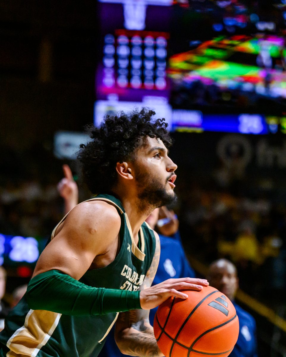 Colorado State University men's basketball guard Josh Pascarelli (1) maps out a three-point shot during CSU's game against the University of Wyoming Jan. 31.