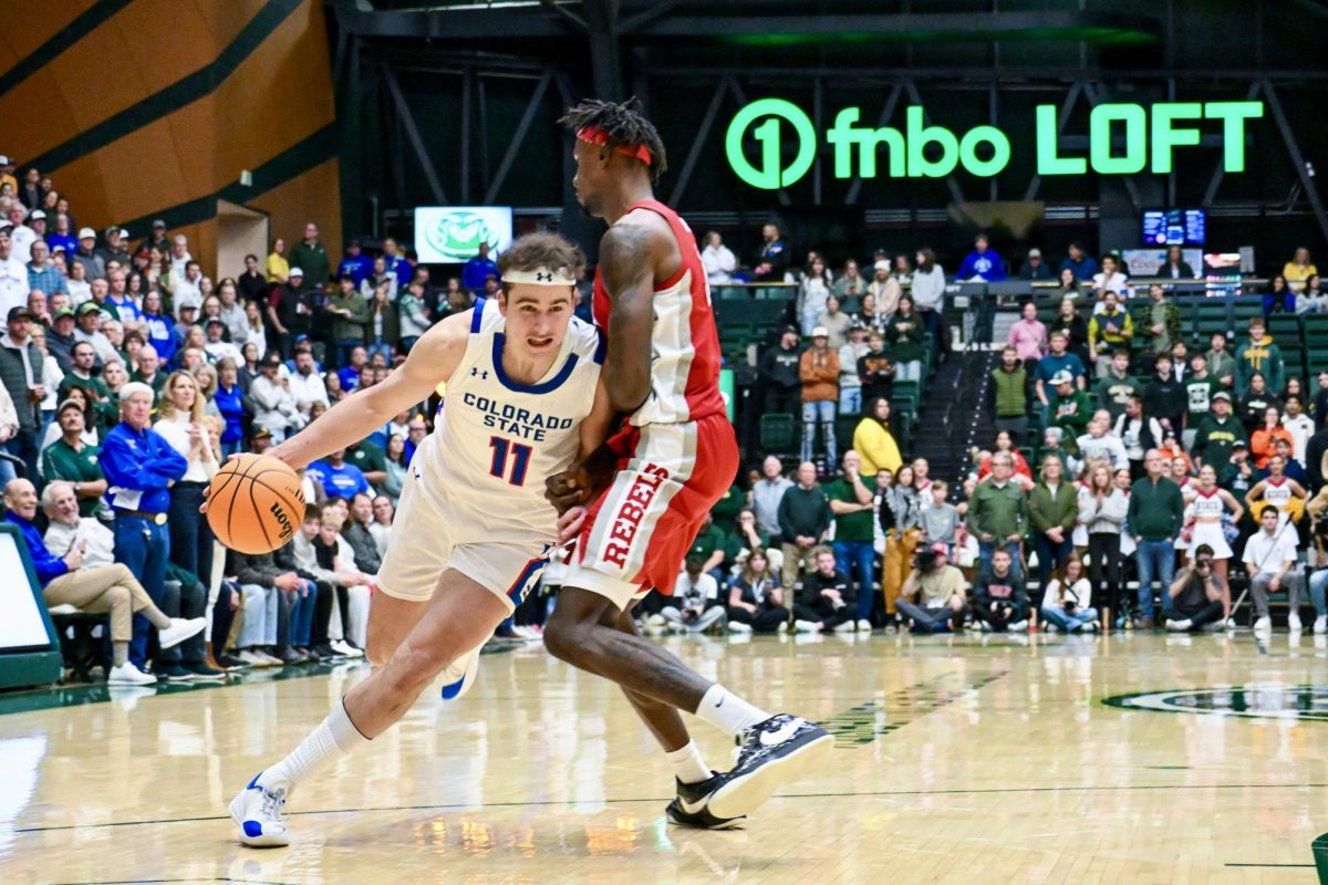 Augustinas Kiudulas (11) pushes past a defender in Colorado State University’s state pride game against UNLV Jan. 9. CSU won 70-62.