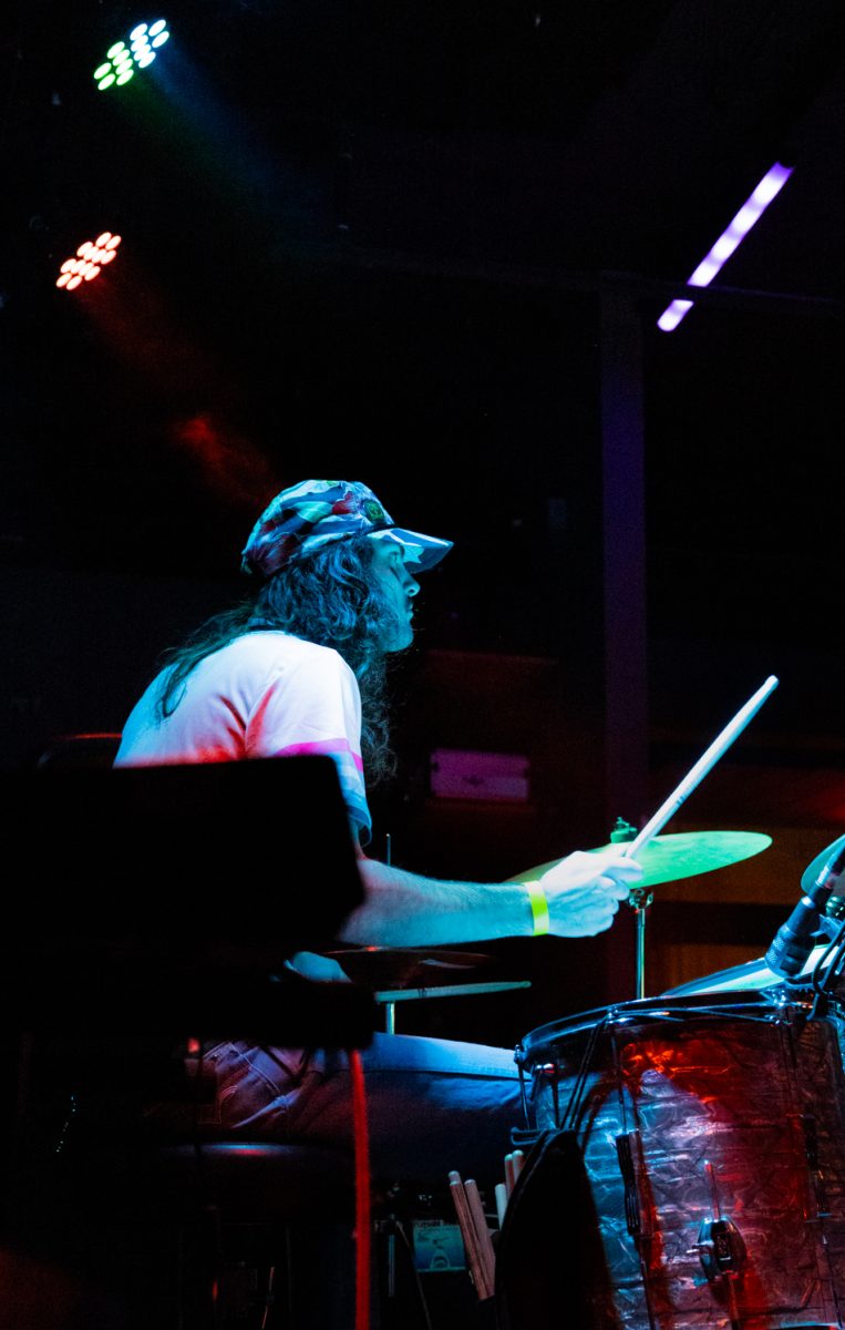 Cooper Long plays drums for band Pet Leslie at the Sound Bar Jan. 30. The band performed alongside Colorado bands Mystee and Blankslate to celebrate the 20th anniversary of FoCo Roller Derby. The event brought the roller derby community together with music, drinks, vintage booths and merchandise as an effort to fundraise for the league. 