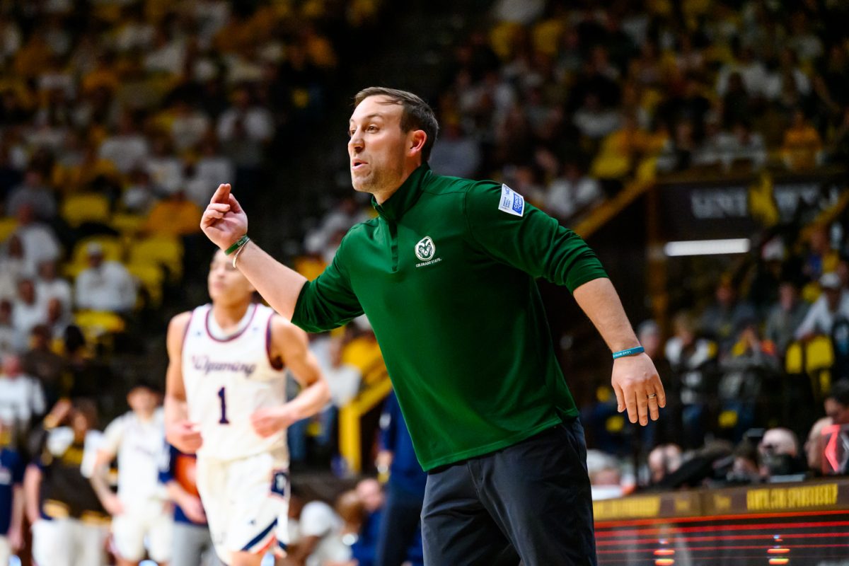 Colorado State University men's basketball head coach Ali Farokhmanesh calls a play to his team during the second half of CSU's game against the University of Wyoming Jan. 31. CSU lost 68-57. "We missed a lot of shots from good shooters who had been making shots all season," Farokhmanesh said. "Sometimes that's basketball, and it sucks when it's against your rival."