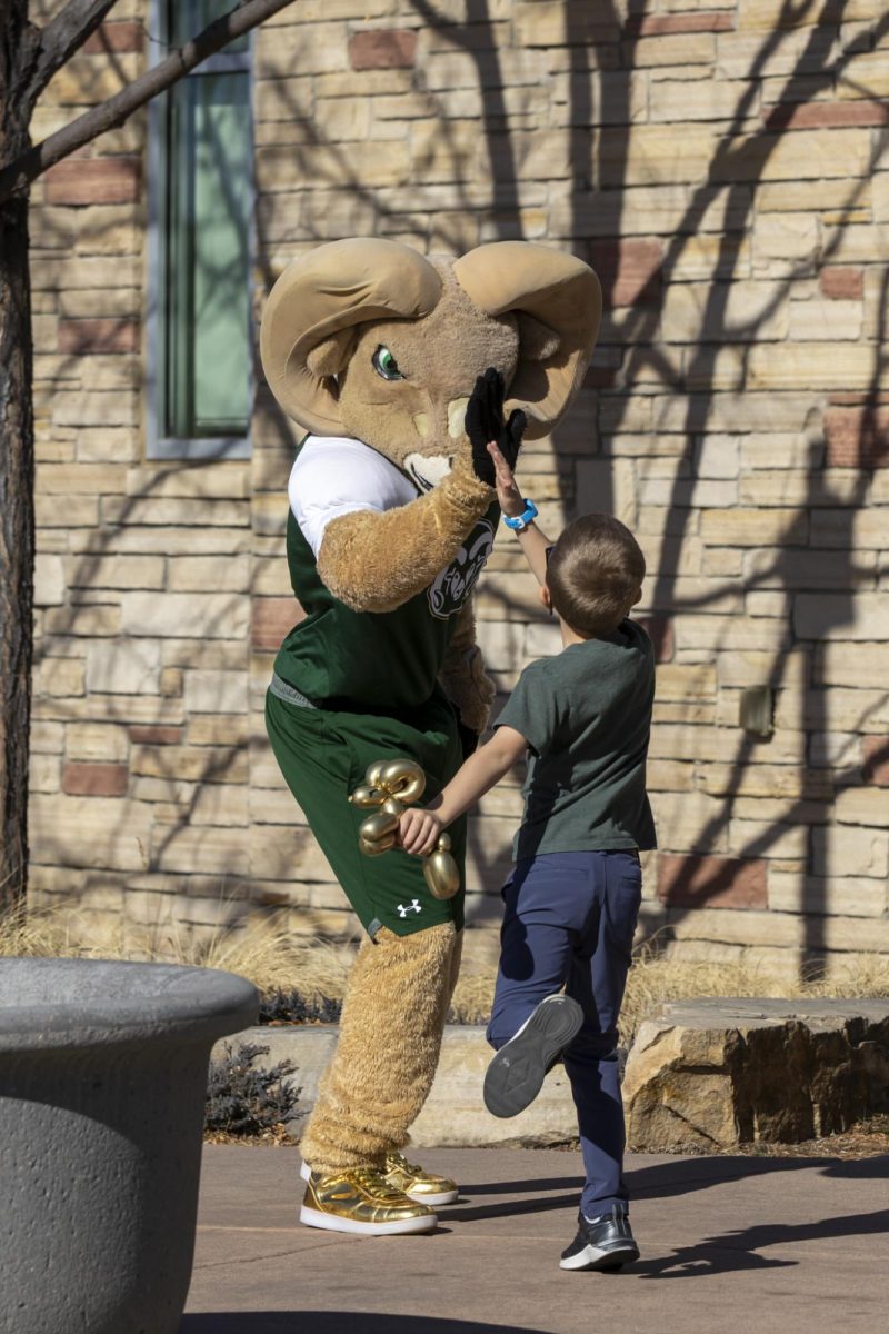 CAM the Ram interacts with kids at his 72nd birthday party.  This event was put on at the Colorado State University Student Recreation Center by the Alumni Association. Feb. 7