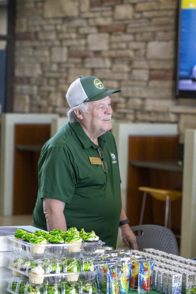 Volunteer Kevin Keefe interacts with guests and helps hand out snacks at the Colorado State University Student Recreation Center for CAM the Ram's 72nd birthday “This is one of my favorite (events), because you get the little kids that you hear having a fun time. They get to do crafts and they get their face painted,” Keefe said. Feb. 7
