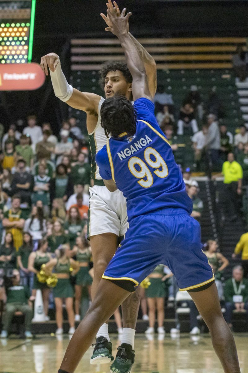 Colorado State University men's basketball guard Josh Pascarelli (1) passes the ball to a teammate during CSU's game against San Jose State University Feb. 7. The Rams won 65-57. 