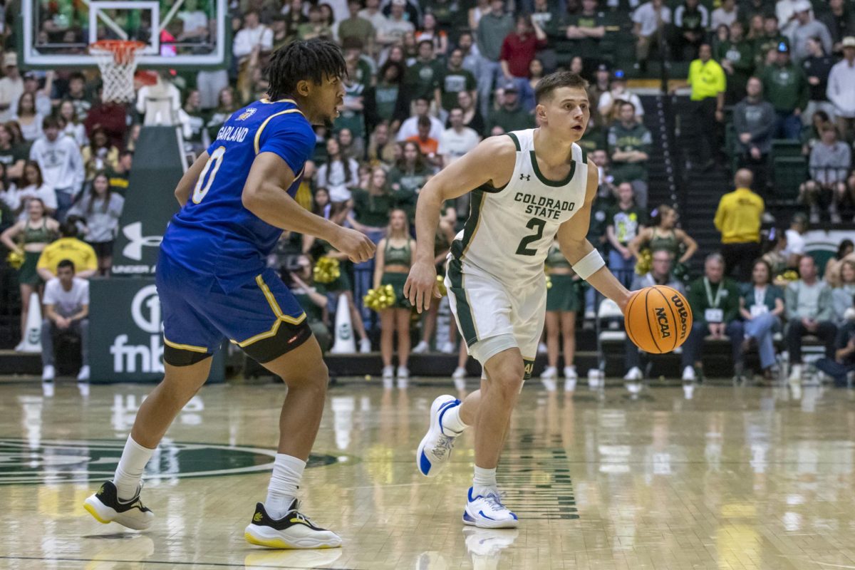 Colorado State University men's basketball guard Brandon Rechsteiner (2) looks to make a pass during CSU's game against San Jose State University Feb. 7.