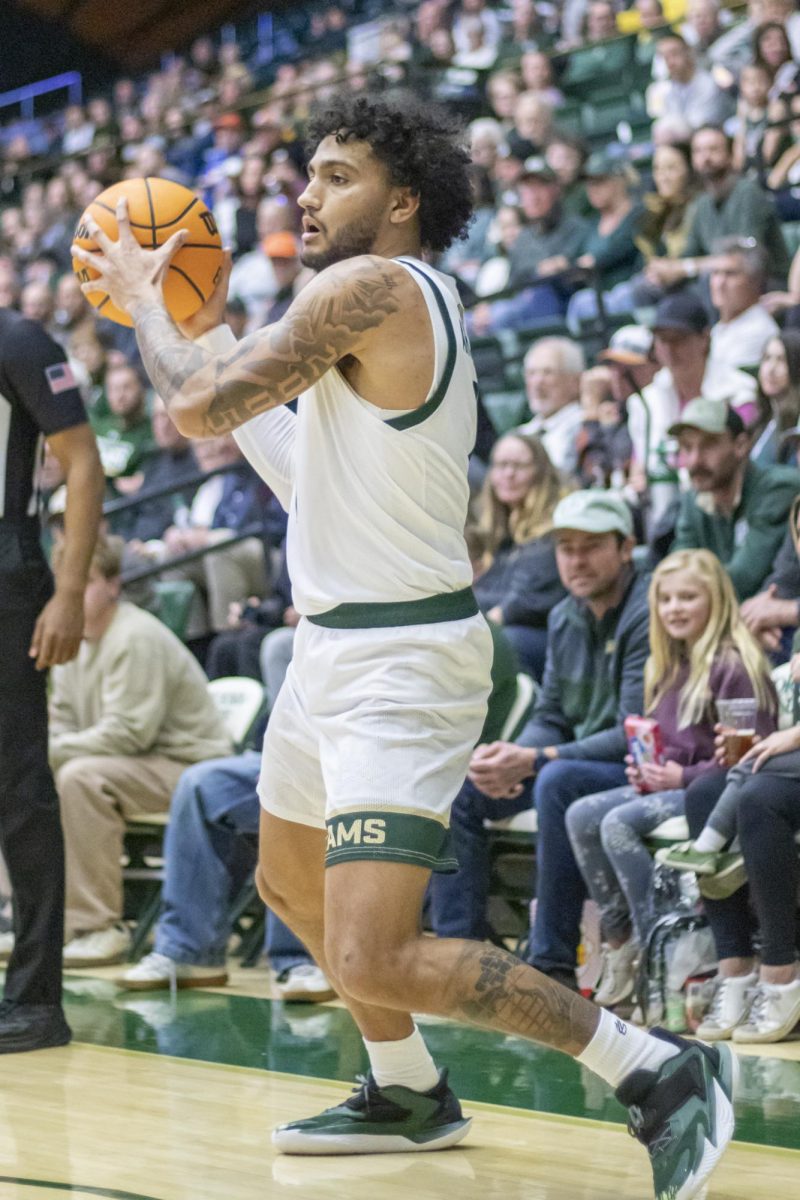 Colorado State University men's basketball guard Josh Pascarelli (1) looks for a pass during CSU's game against San Jose State University Feb. 7.