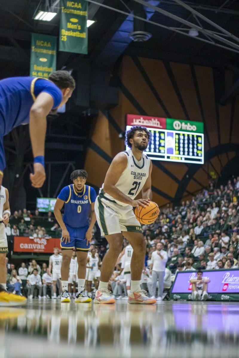 Colorado State University men's basketball forward Rashaan Mbemba (21) takes a free point shot during CSU's game against San Jose State University Feb. 7