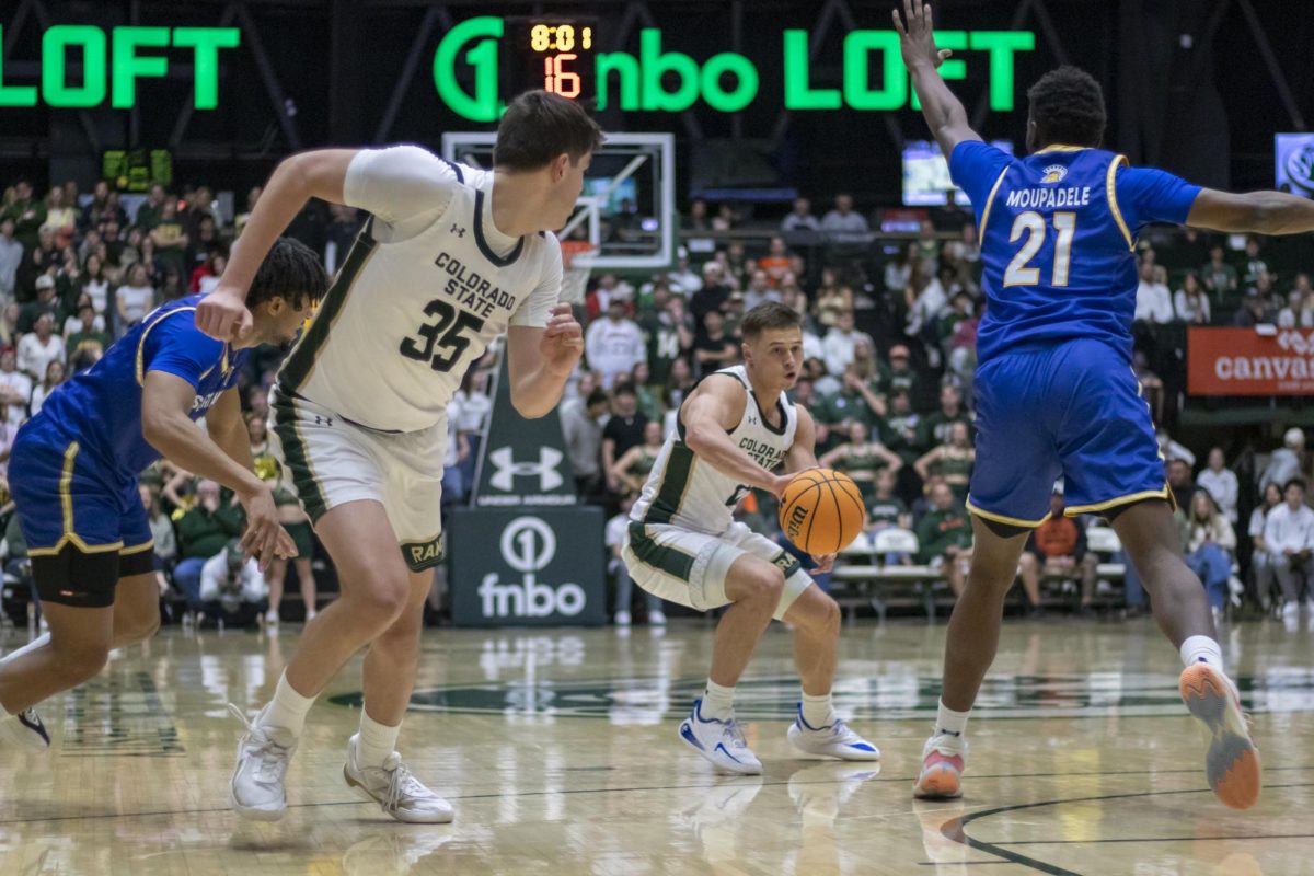 Guard Brandon Rechsteiner (2) passes the ball to forward Kyle Jorgensen (35) in game against San José State University. The Colorado State University Rams won 65-57 in their game played at Moby Arena. Feb. 7