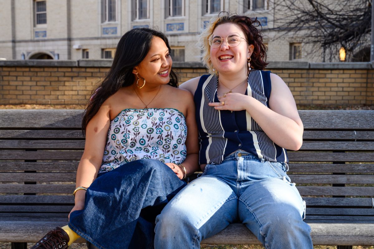 Colorado State University students Nicole Vicente and Millie Queen talk about the story of their relationship on the CSU Oval Feb. 7. Vicente and Queen met at CSU and have been a couple for nine months. "She would tell me all this stuff about how beautiful and wonderful I am, and we'd go basically on dates together," Vicente said. "This is all when we're living together, but we're not dating yet."
