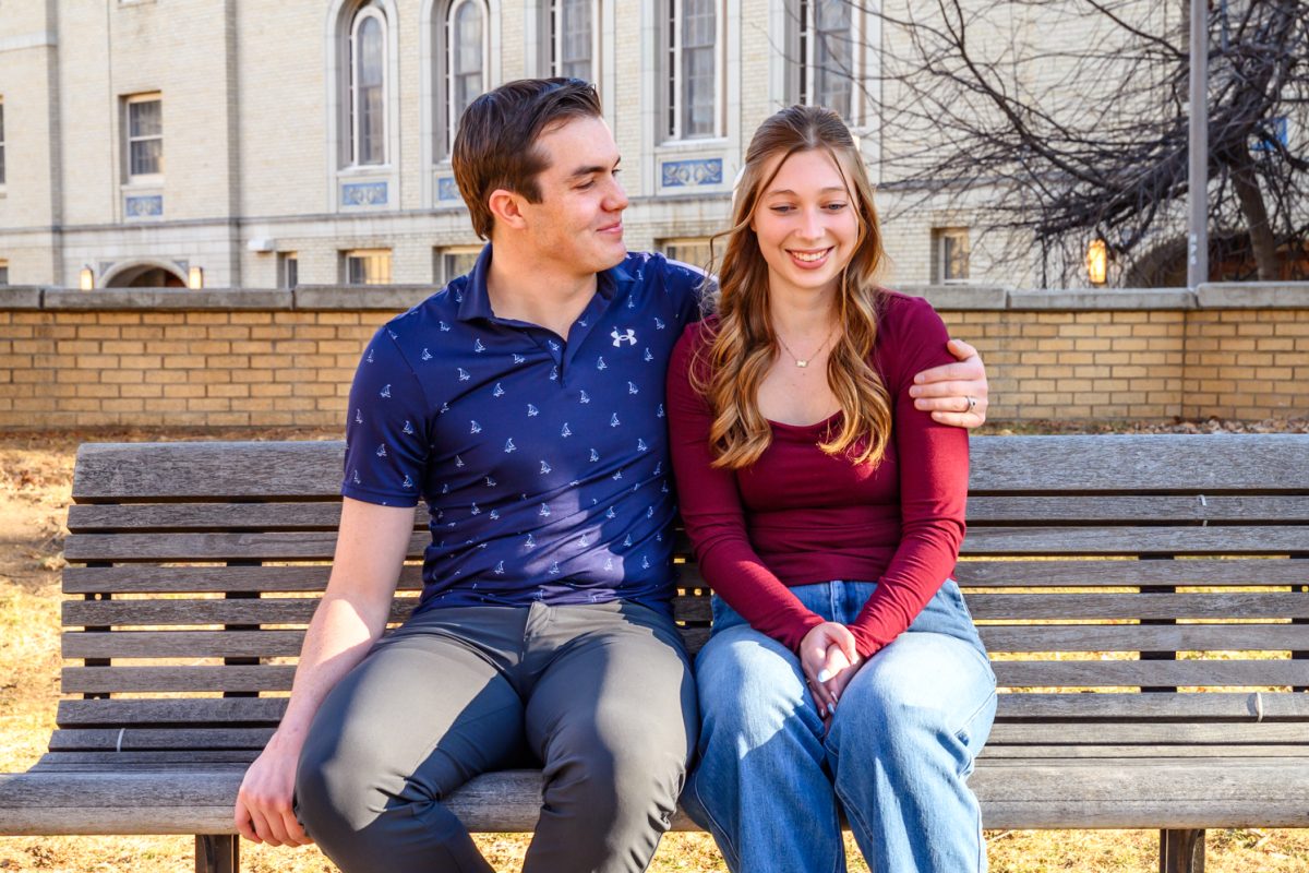 Colorado State University graduate Cassie Lyon and student Kyle Dahle talk about their relationship on the CSU Oval Feb. 7. Lyon and Dahle have been together for two years and had their first date at a CSU basketball game. "I would work in the LSC, and her club was in the LSC every Wednesday," Dahle said. "I would always find an excuse to go up to where her room was and see if I could run into her."