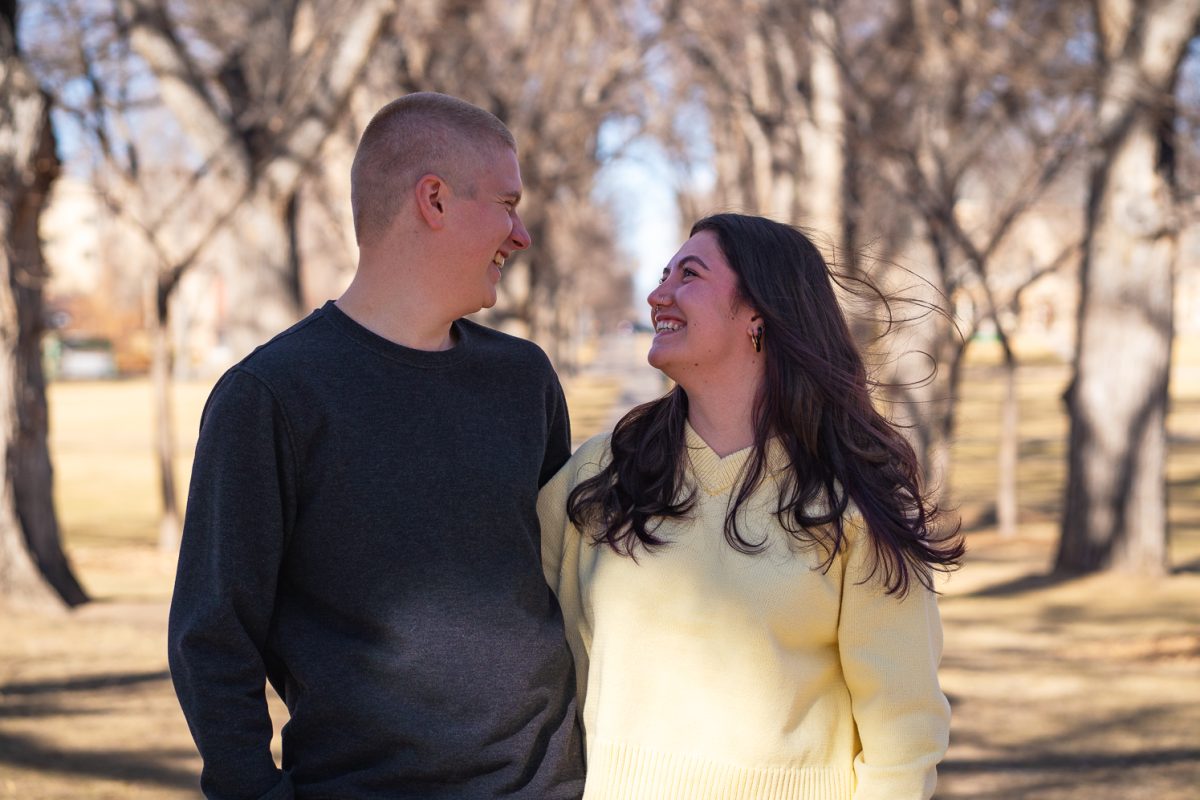 Jasmyn Taylor and Dennis Princic pose for a photo on The Oval at Colorado State University Feb. 8. 