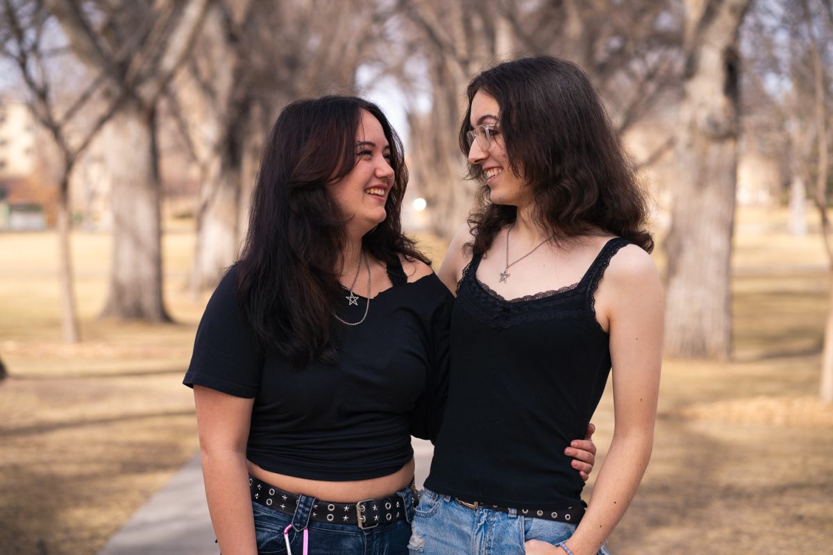 Vega Fecteau and Ori Becker pose for a photo on The Oval at Colorado State University Feb. 8. 