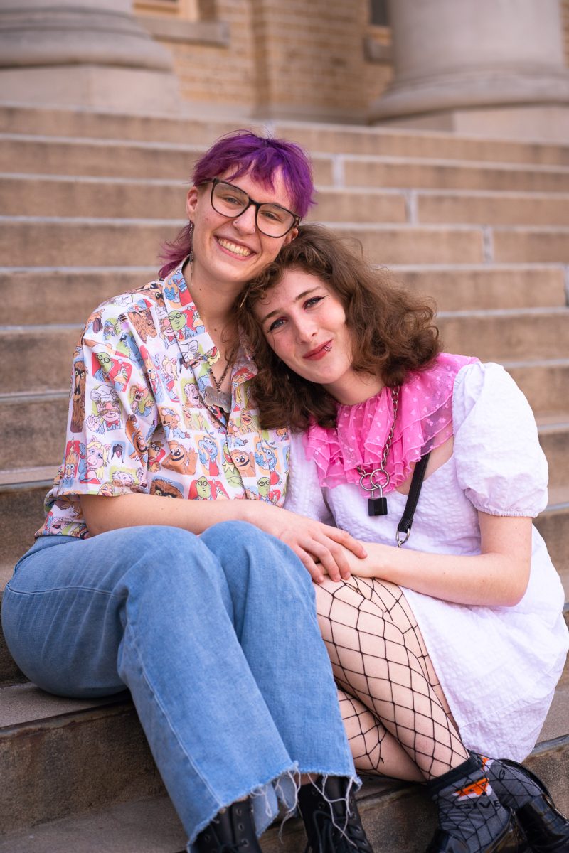 Ella Smith and Harper Paul pose for a photo on the steps of the Colorado State University Administration Building Sunday, Feb. 8. 
