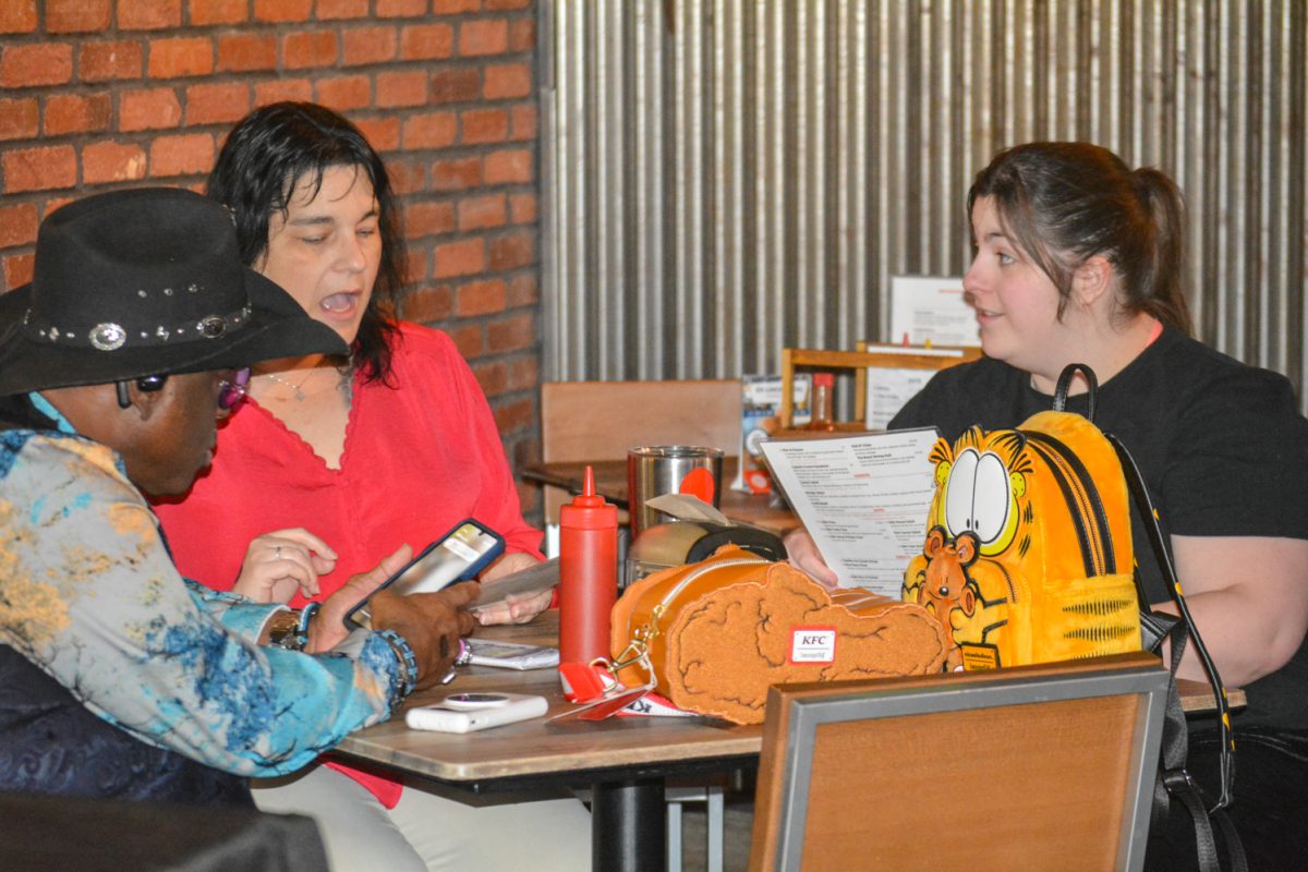 Amber Austin, Dawn Austin and Terry Keys waiting for Drag Bingo to begin Feb. 11. "I am a really big fan of all the drag scenes" Amber states "I wanted to support local drag." 