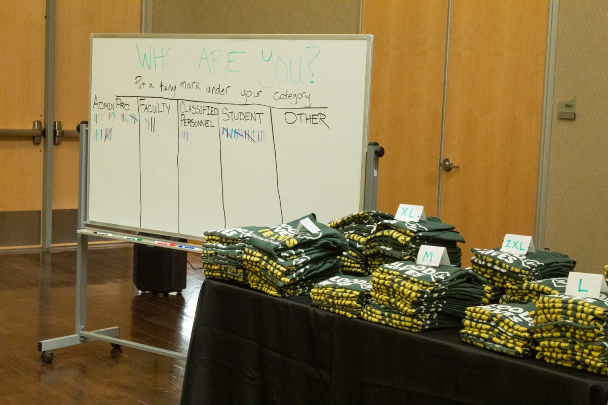 Tshirts, with the phrase “Blood drives save lives,” sit on a table for blood donors to take at the Garth Englund Blood Center’s blood drive, in the Lory Student Center, Feb. 18. Behind the table sits a whiteboard where donors tally their affiliation. Most donors were Colorado State University staff and students.