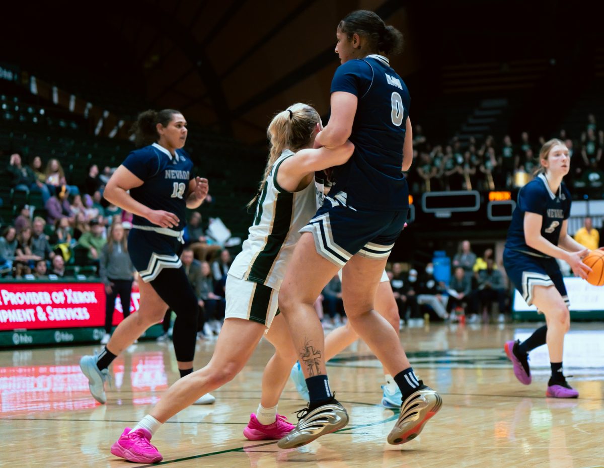 CSU Women's basketball player Hannah Ronsiek (30) plays defense against Nevada. CSU won 70-59 on Feb. 18.