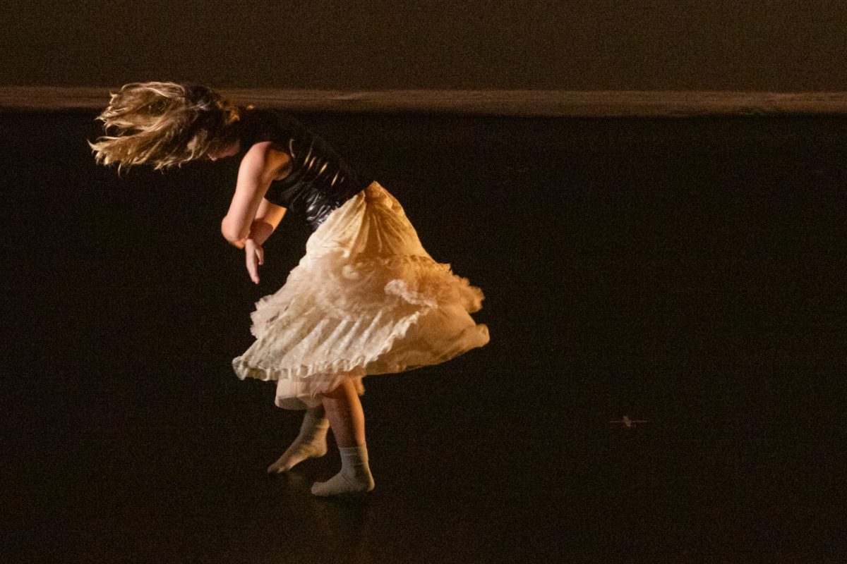 A performer from University of Wyoming Dance strikes a pose during a dress rehearsal of Everything is Fine, part of Body/Speak: Dance Community Collaboration in the University Dance Theater, Feb. 20. This dance concert aims to provide an uplifting environment for local artists to showcase their talent, and is co-directed by Susie Garifi and Julia Cooper.